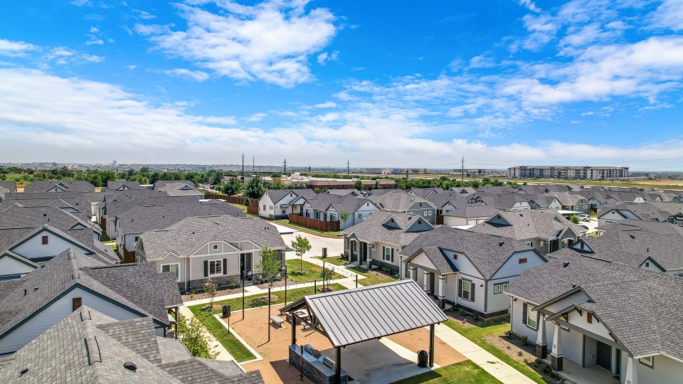 the aerial view of a residential neighborhood with lots of houses at The VLux Trails